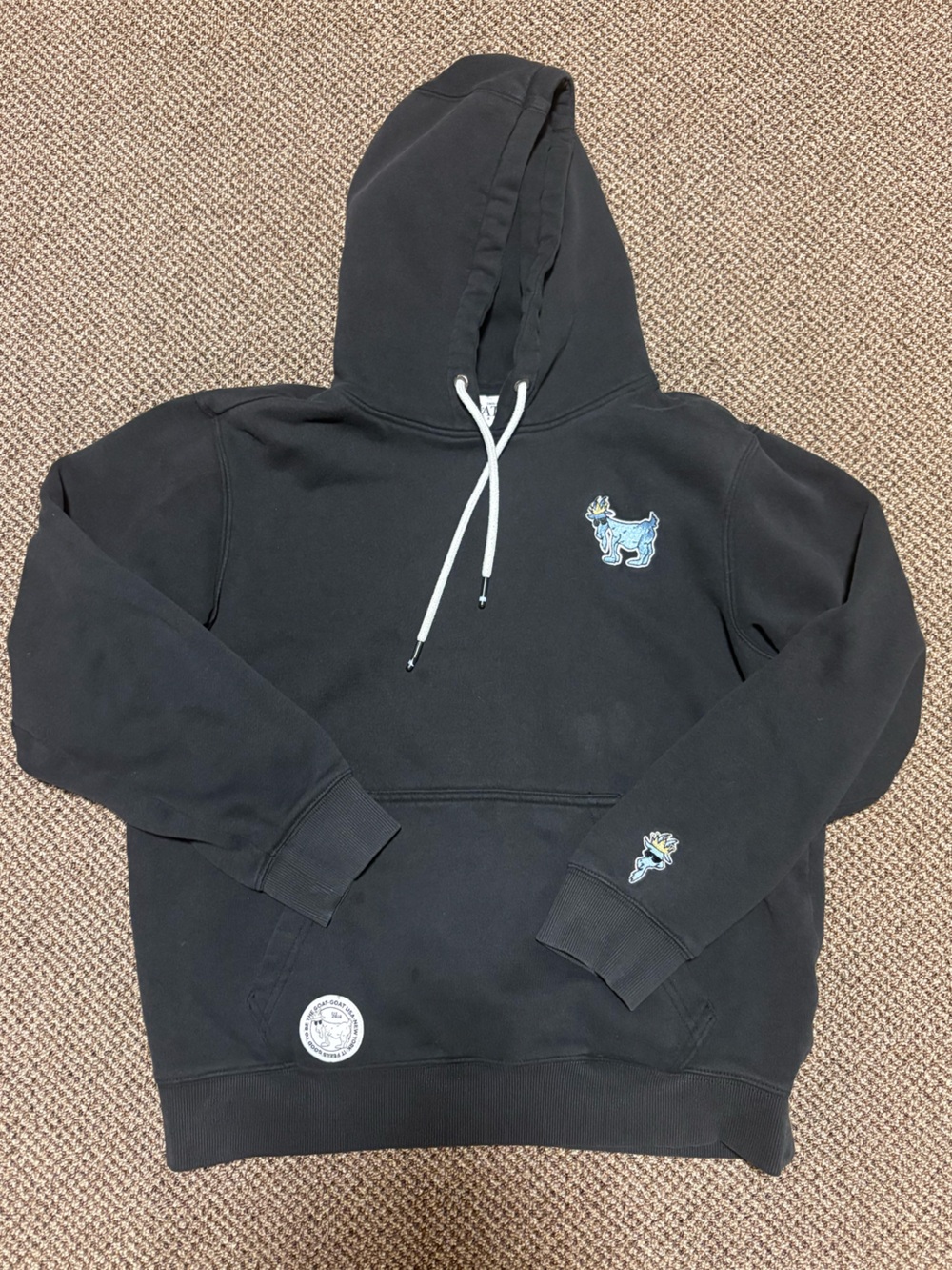 Men's Black Pullover Hoodie with Small Embroidered Motifs